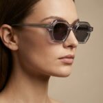 Den γκρι διάφανο πολυγωνικό γυαλί ηλίου